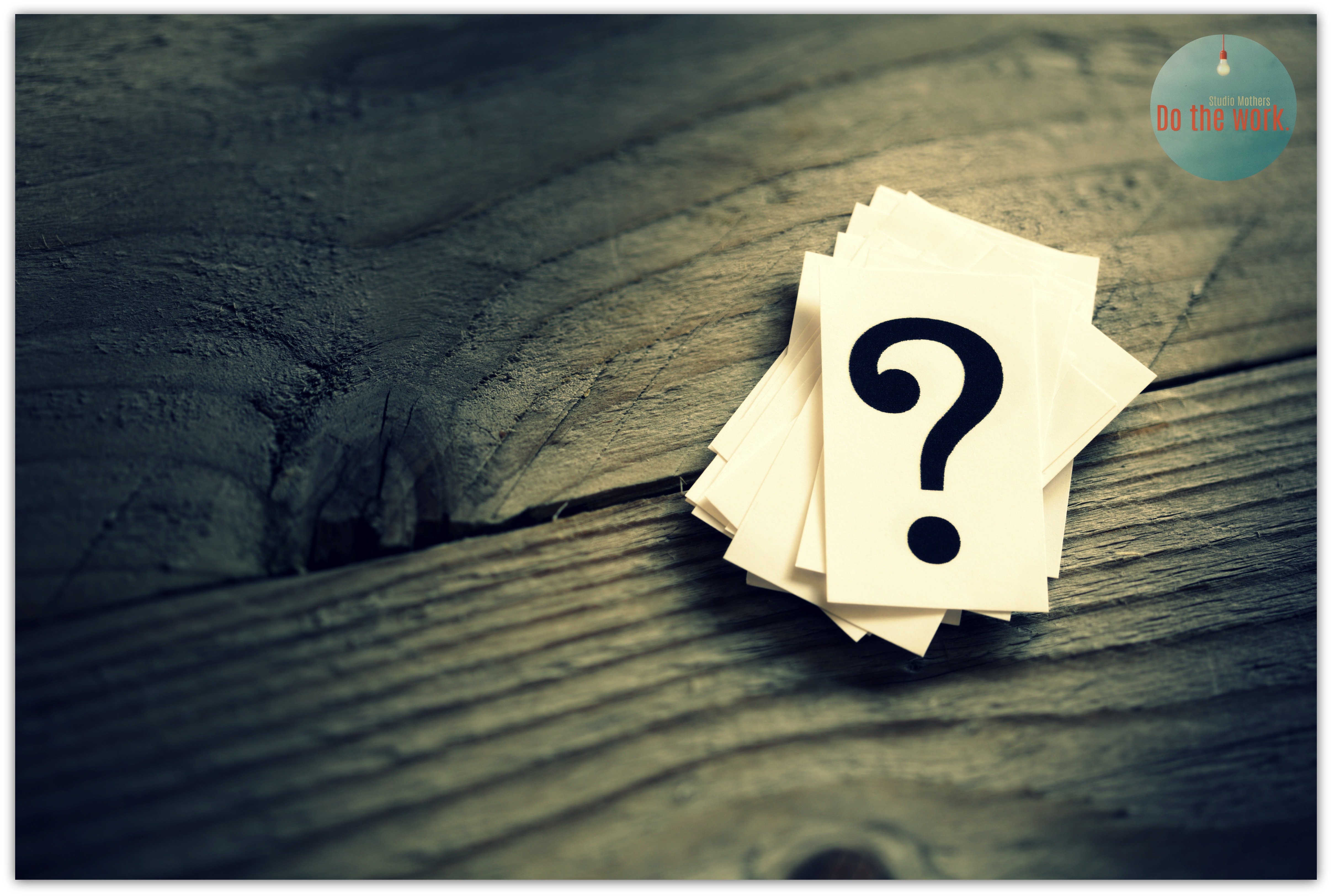 Question mark heap on table concept for confusion, question or solution